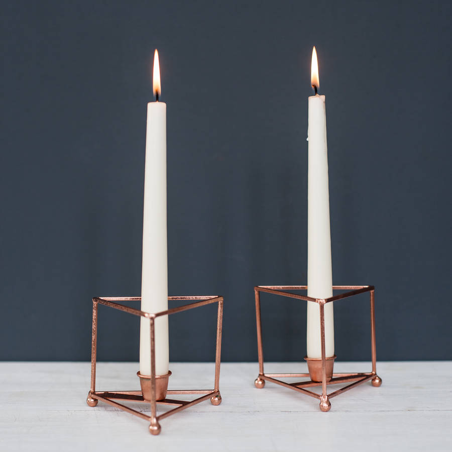 pair of geometric copper candle holders by the forest & co