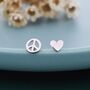Tiny Mismatched Peace And Love Stud Earrings In Sterling Silver, thumbnail 1 of 12