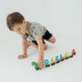 Personalised Brightly Coloured Dinosaur Wooden Train, thumbnail 2 of 2