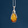 Sterling Silver Baltic Amber Penguin Necklace, thumbnail 1 of 11