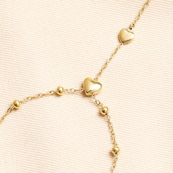Stainless Steel Heart Charm Hand Chain In Gold Plating, 2 of 4