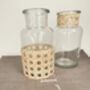 A Pair Of Vintage Rattan Glass Vases, thumbnail 1 of 4