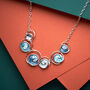 Silver Blue Spiral Disc Enamel Necklace, thumbnail 3 of 4