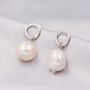 Sterling Silver Circle With Dangling Baroque Pearl Drop Stud Earrings, thumbnail 1 of 12