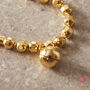 Gold Faceted Ball Musical Charm Bracelet 18 K Gold And Silver, thumbnail 9 of 12