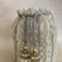 Handcrafted Ivory Pearl Potli With Pearl Wrist Chain, thumbnail 3 of 9