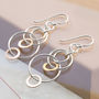 Silver And Rose Gold Swinging Circles Dangly Earrings, thumbnail 1 of 4