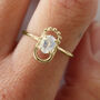 Etta Oval Moonstone 9ct Gold Halo Ring, thumbnail 1 of 7