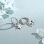 Sterling Silver Tiny Plumeria Flower Huggie Hoop Earrings, thumbnail 3 of 11