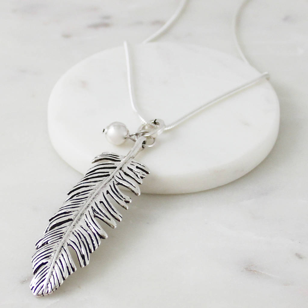 metal feather pendant necklace by my posh shop | notonthehighstreet.com