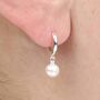 Sterling Silver Round Pearl Huggie Hoop Earrings, thumbnail 1 of 7