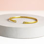 Gold Slender Torque Bangle With White Sapphires, thumbnail 1 of 2