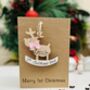 Personalised First Christmas Bauble Card Baby Girl's 2025, thumbnail 1 of 9