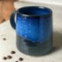 Set Of Four Reactive Glaze Brûlée Mugs In Black And Blue, thumbnail 5 of 7