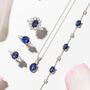 Blue Sapphire Oval Cut Three Stone Engagement Ring In Sterling Silver, thumbnail 4 of 12