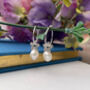Sterling Silver Flower And Pearl Drop Hoop Earrings, thumbnail 6 of 10