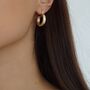 Thick Gold Plated Huggie Hoop Earrings, thumbnail 1 of 5