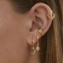 Sterling Silver Star And Moon Huggie Earrings, thumbnail 2 of 8