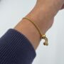 Adjustable Clover Bracelet In Pearl And Gold, thumbnail 5 of 6