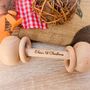 Babies 1st Christmas Personalised Wooden Rattle, thumbnail 1 of 3