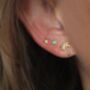 Gold Cosmic North Star White Topaz Tiny Stud Earrings, thumbnail 2 of 8