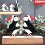 Christmas Puffins With Mistletoe On Block, thumbnail 1 of 1