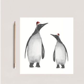 Penguin And Baby Festive Red Hat Christmas Card, 2 of 5