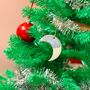 Handmade Ceramic Moon Ornament: Blue And White Glaze, Festive Tree Decoration, thumbnail 3 of 4