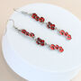 Tiny Poppy Dangle Earrings, thumbnail 2 of 3
