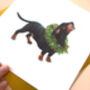 Dachshund 'Happy Howlidays' Illustrated Christmas Card, thumbnail 4 of 6