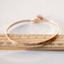 Blessed Slim Brass Bangle In Gold Or Silver Finish, thumbnail 4 of 12