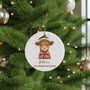 Personalised Baby’s First Christmas Highland Cow Bauble, thumbnail 1 of 8