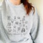 Embroidered Hand Drawn Lots Of Dogs Sweatshirt, thumbnail 1 of 6