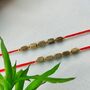 Indian Tulsi Bead Rakhi For Raksha Bandhan, thumbnail 1 of 7