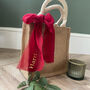 Personalised Red Ribbon Christmas Gift Bag, thumbnail 1 of 2