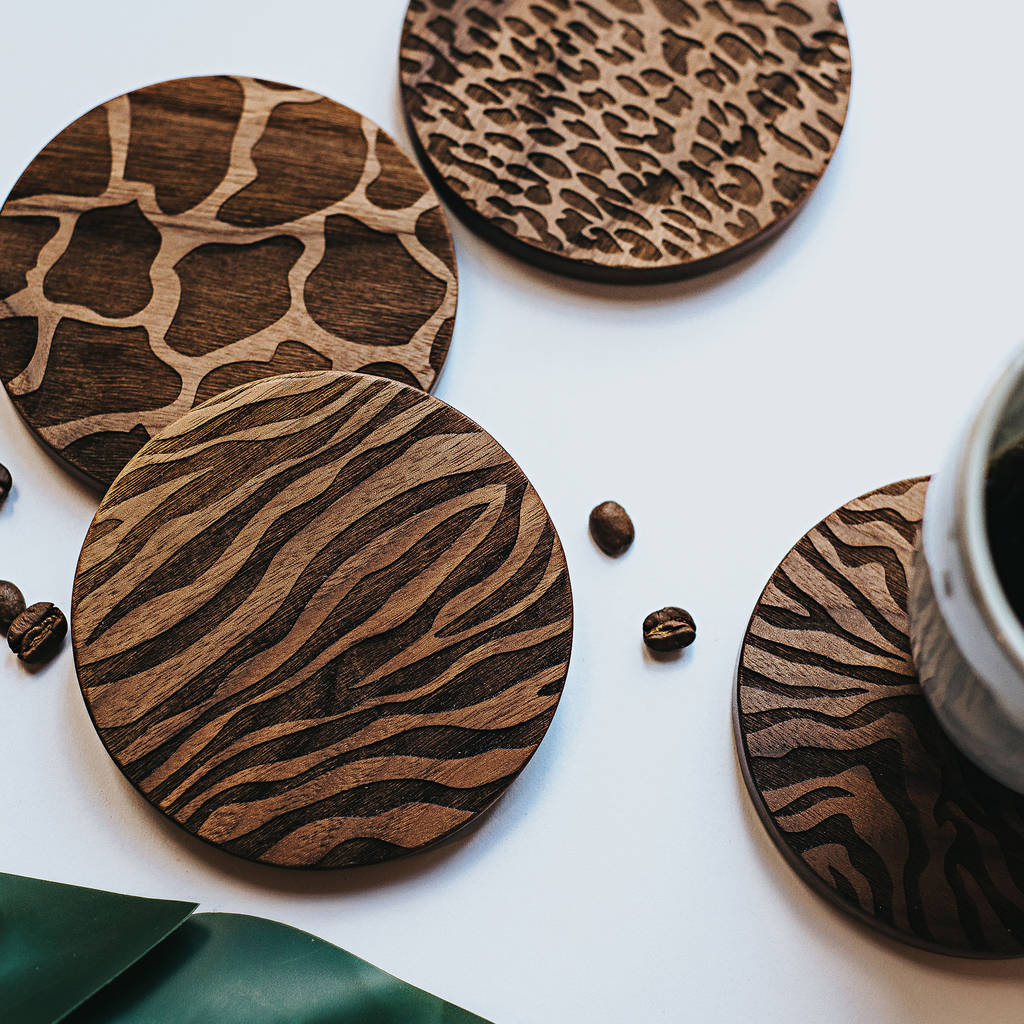 wood animal print coaster set of four by create gift love