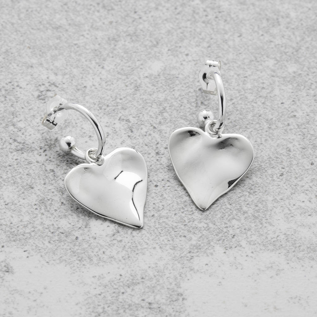 rose gold and silver heart earrings by under the rose