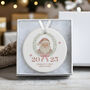 Baby's First Christmas Ceramic Bauble Keepsake In Pink Or Blue, thumbnail 1 of 6