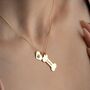 Dog Bone Necklace With Name In Sterling Silver, thumbnail 1 of 6