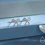 Sterling Silver Braided Ribbon Bow Stud Earrings, thumbnail 1 of 12