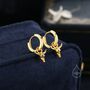 Sterling Silver Tiny Bull Skull Huggie Hoop Earrings, thumbnail 2 of 10
