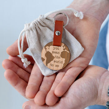 Engraved 'You Mean The World To Me' Wood Globe Keyring, 2 of 4