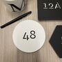 Monochrome Laser Cut Round House Number, thumbnail 1 of 11