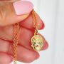 Skull Necklace With Emerald Crystals In Gold Plate, thumbnail 3 of 5