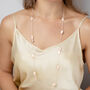 Elegant Long Baroque Confetti Matt Rose Gold Necklace, thumbnail 1 of 3