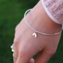 Hammered Bangle With Duo Leaf Charm, thumbnail 1 of 8