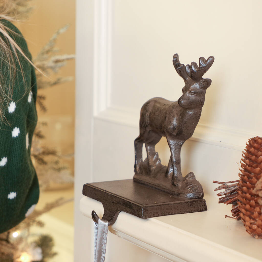 cast iron reindeer stocking hanger by dibor