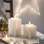 Two White Wax Star Shaped Tru Glow® LED Battery Candles, thumbnail 2 of 4