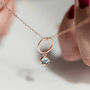 Rose Gold Plated Circle Necklace With Birthstone Charm, thumbnail 4 of 8
