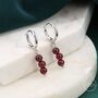 Sterling Silver Genuine Garnet Stone Trio Huggie Hoop Earrings, thumbnail 1 of 10